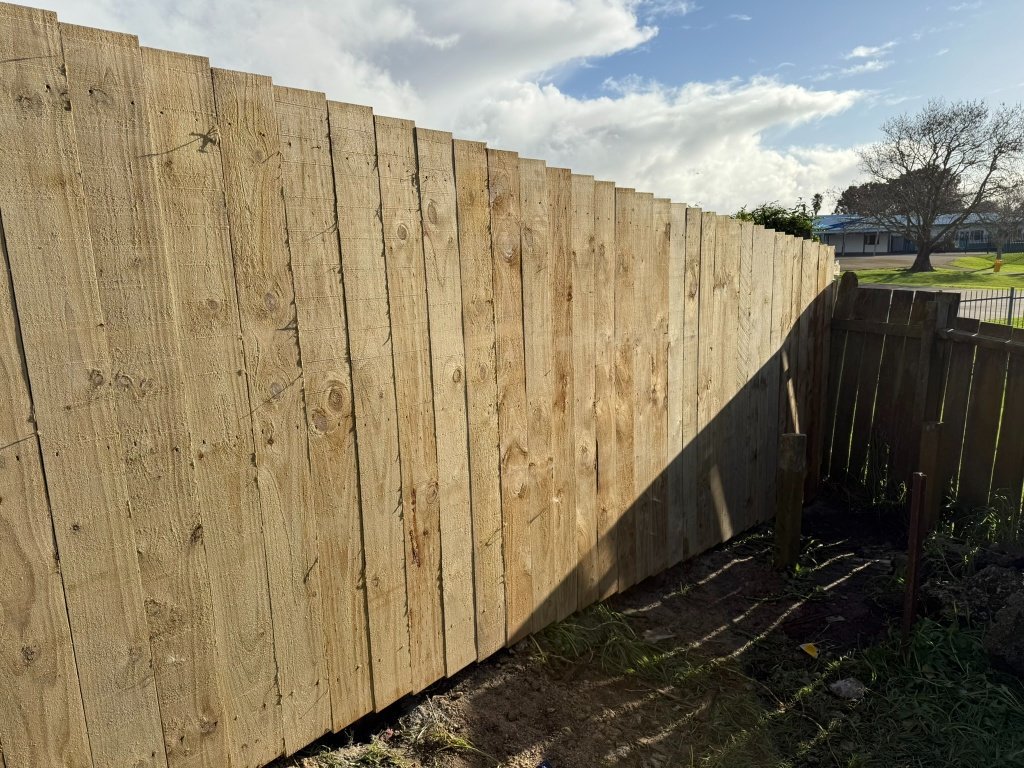 Stepped Timber Paling Fence